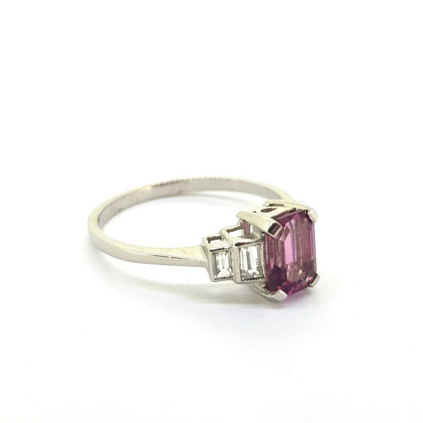 Pink Tourmaline and Baguette Diamond Ring in Platinum; central 0.95ct pink tourmaline flanked by graduated baguette-cut diamonds