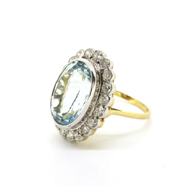 8.10ct Aquamarine and Diamond Oval Cluster Ring