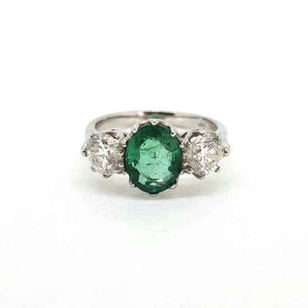 1..70ct Emerald and Diamond Three Stone Ring in Platinum
