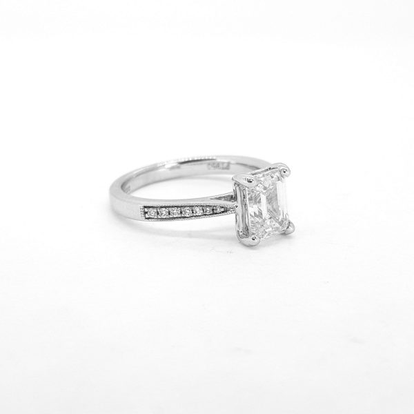 Emerald Cut Diamond Engagement Ring in Platinum, 1.53ct claw-set emerald-cut diamond flanked by brilliant-cut diamond set shoulders