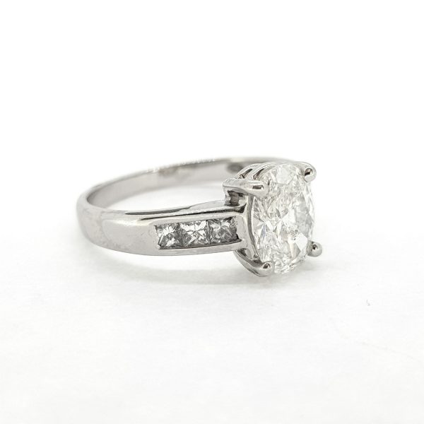 1.22ct Oval Cut Diamond Engagement Ring with Princess Cut Diamond Shoulders
