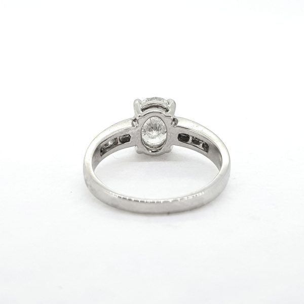 1.22ct Oval Cut Diamond Engagement Ring with Princess Cut Diamond Shoulders