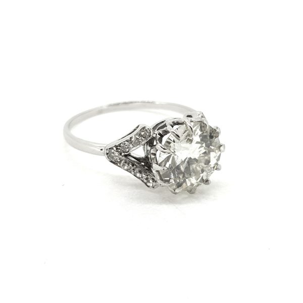 Art Deco 2.20ct Diamond Solitaire Ring with Diamond Shoulders; single stone diamond engagement ring, central claw-set 2.20 carat diamond with pave-set diamond split shoulders
