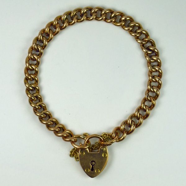 Rose Gold Curb Link Bracelet with Heart Padlock Clasp; traditional 9ct rose gold curb link bracelet secured with a heart padlock clasp, heart marked for P&M Ltd, Birmingham