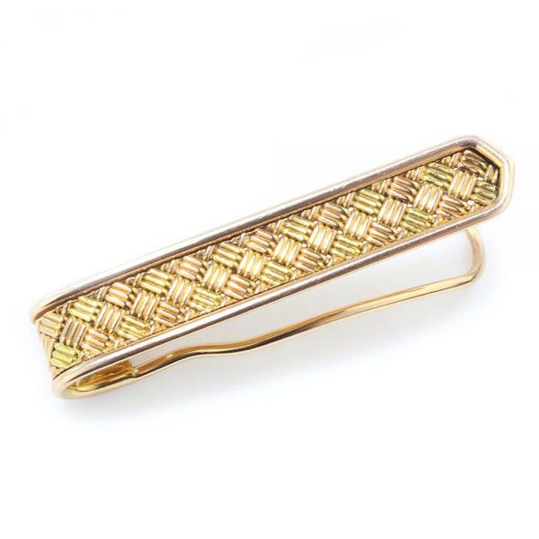Vintage Cartier 18ct Gold Tie Pin; featuring a repeating alternating pattern of three gold lines. Designed by Jacques Cartier, Made in London, Circa 1964