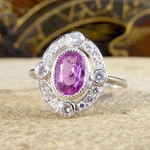 Contemporary 1.05ct Pink Sapphire and Diamond Halo Ring