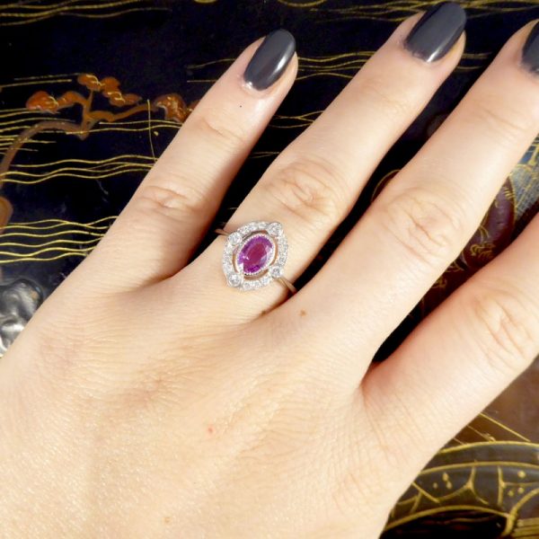Contemporary 1.05ct Pink Sapphire and Diamond Halo Ring