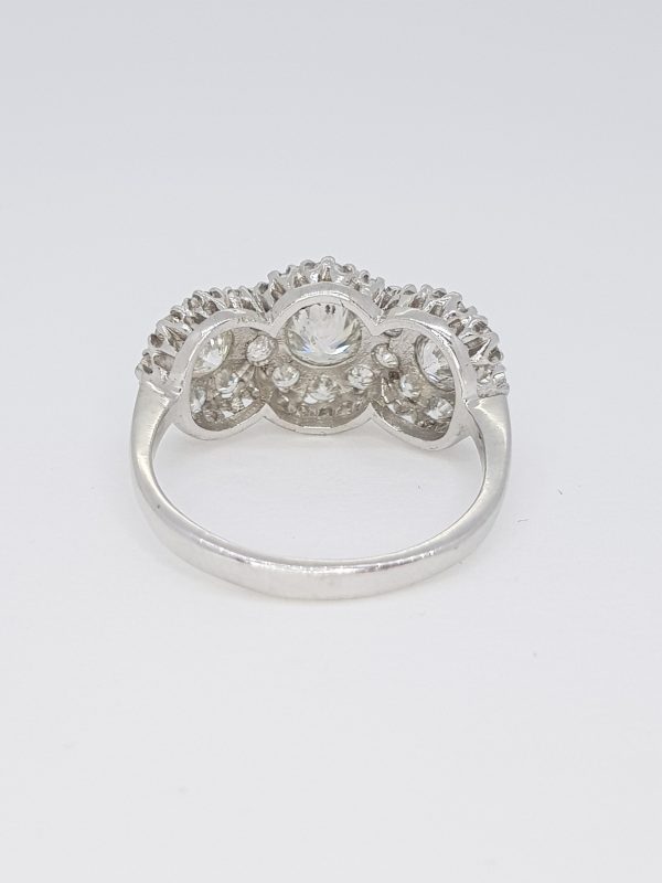Diamond Triple Cluster Ring; featuring three diamond clusters, mounted in 18ct white gold