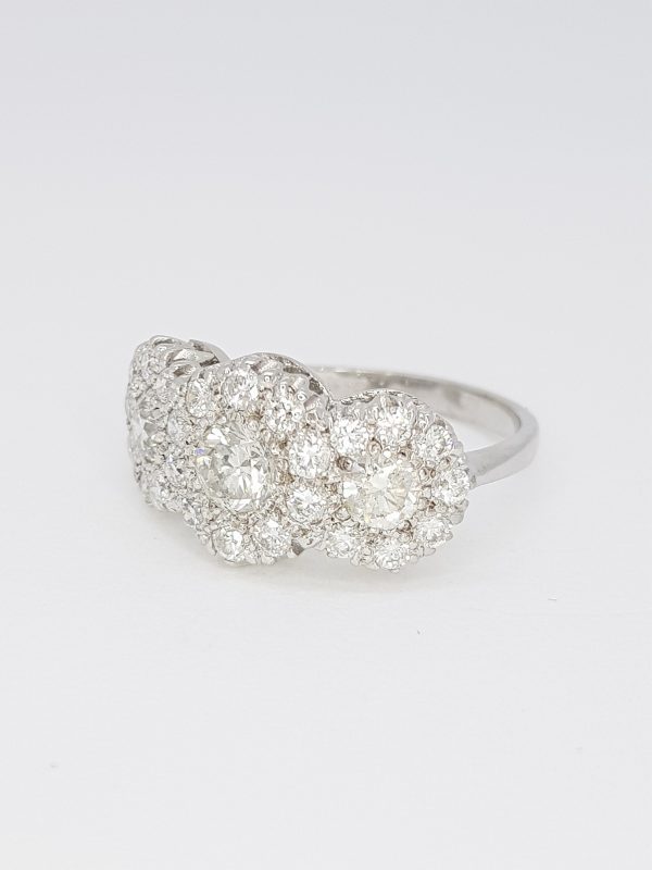 Diamond Triple Cluster Ring; featuring three diamond clusters, mounted in 18ct white gold