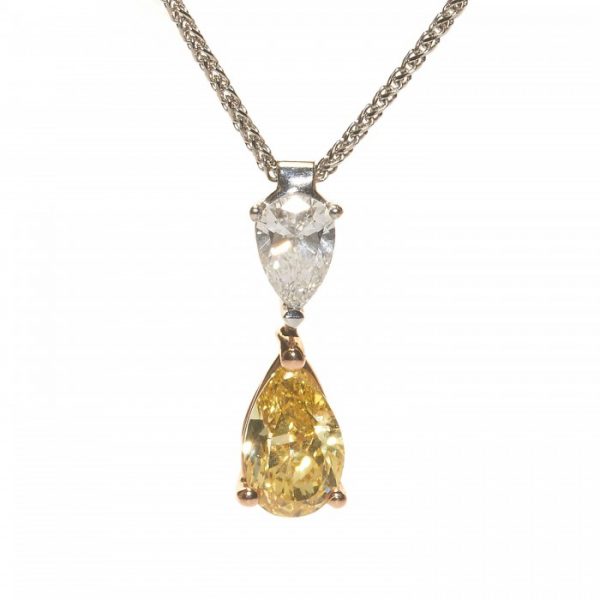 Pear Cut Fancy Yellow and White Diamond Pendant, 0.88ct natural fancy vivid yellow diamond and inverted 0.35ct D colour white diamond in 18ct yellow and white gold, with GIA certificates