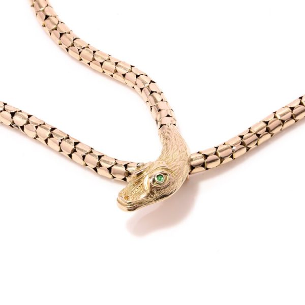 Antique Victorian Gold Snake Necklace with Tourmaline Eyes; 9ct yellow gold snake necklace with scale detail to body and green tourmaline eyes, Circa 1860s