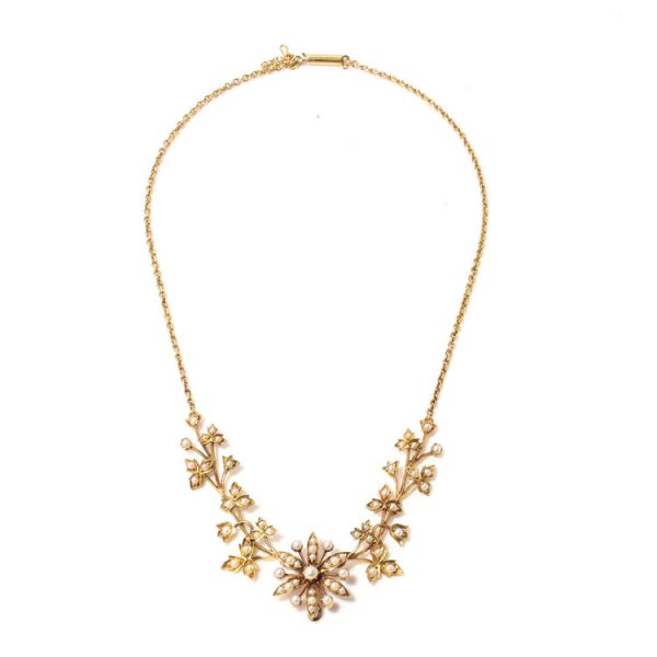 Antique Edwardian 15ct Gold and Seed Pearl Floral Cluster Necklace; four articulated floral sections linked to an integrated 15ct gold chain, that leads to the flower pendant, in original box