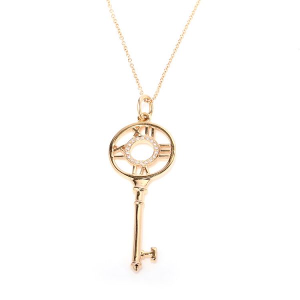 Tiffany and Co 18ct Gold and Diamond Atlas Key Pendant with Chain; 18ct pink gold Atlas key pendant with brilliant-cut diamonds, in original Tiffany & Co box