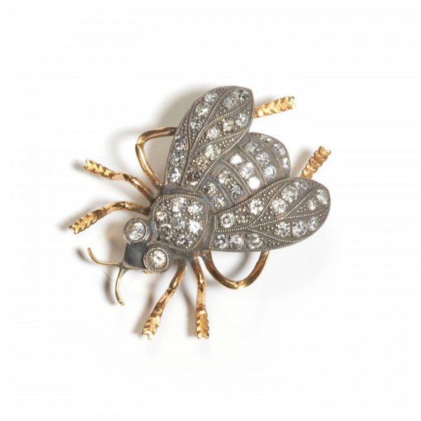 Modern Diamond Bee Brooch; set with eight-cut and round brilliant-cut diamonds in the wings, thorax, abdomen and head, with millegrain edges and wing markings. Mounted in silver-upon-gold, with gold legs and antennae