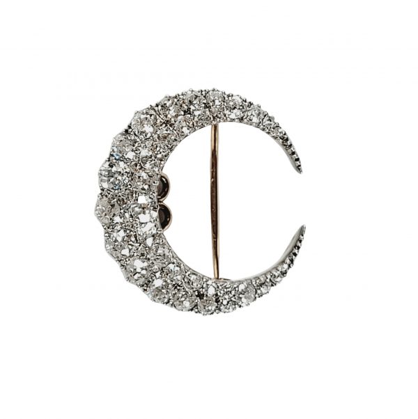 Antique Victorian Old Cut Diamond Crescent Brooch, set with two full rows of chunky old-cut diamonds totalling 4.00 carats, in silver-upon-gold, English, 19th century Circa 1870