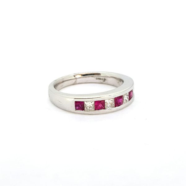 Princess Cut Ruby and Diamond Half Eternity Band Ring; channel-set with alternating square-cut rubies and diamonds in 18ct white gold