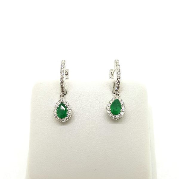 Emerald and Diamond Pear Shaped Cluster Drop Earrings; 0.76ct pear-shaped emeralds within diamond surrounds suspended from diamond-set tops, in 18ct white gold