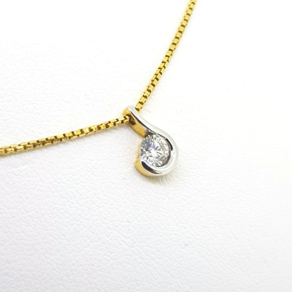 Contemporary Diamond Pendant; modern 0.40ct solitaire diamond in a white gold setting, suspended on an 18ct yellow chain