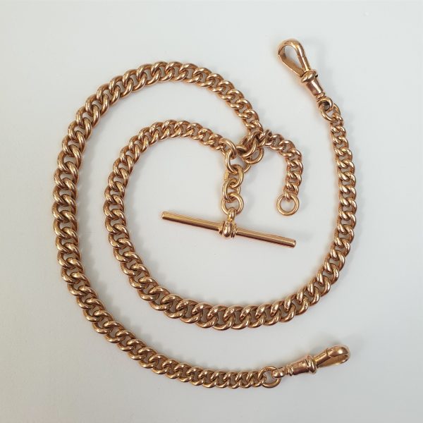 An Edwardian double graduated gold Albert chain necklace, this original pocket watch chain can have a dual purpose as a necklace. Each link has been stamped 9 and there is a Chester 9ct gold hallmark in the middle of one chain.