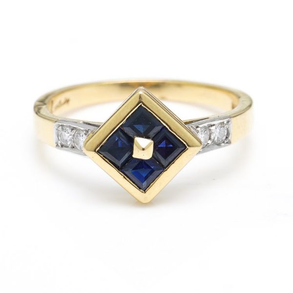 Vintage Kutchinsky Sapphire and Diamond Ring, central diamond-shaped cluster set with square-cut blue sapphires flanked by diamond-set shoulders, in 18ct yellow gold, with original Kutchinsky box, Made in England, Circa 1979