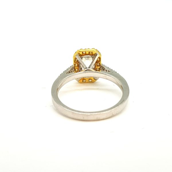 Emerald Cut Diamond Ring with Yellow Diamond Halo