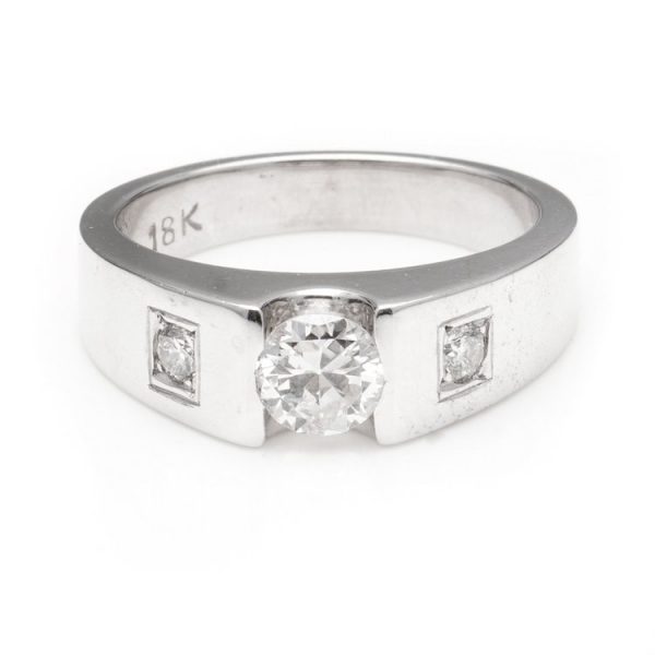 Vintage Three Stone Diamond Ring, featuring three diamonds mounted into a chunky 18ct white gold shank, Circa 1980s