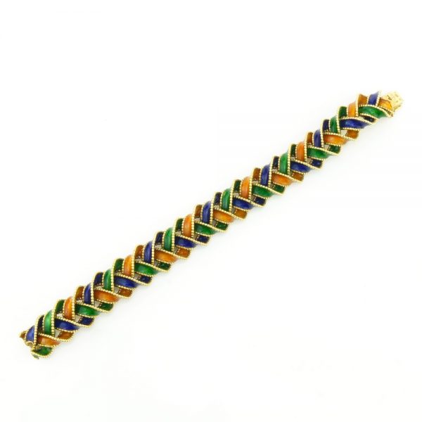 Vintage Van Cleef and Arpels 18ct Gold and Enamel Plait Bracelet; a plaited 18ct yellow gold bracelet decorated with orange, green and blue enamel, Signed and Numbered, in original box, Circa 1960s