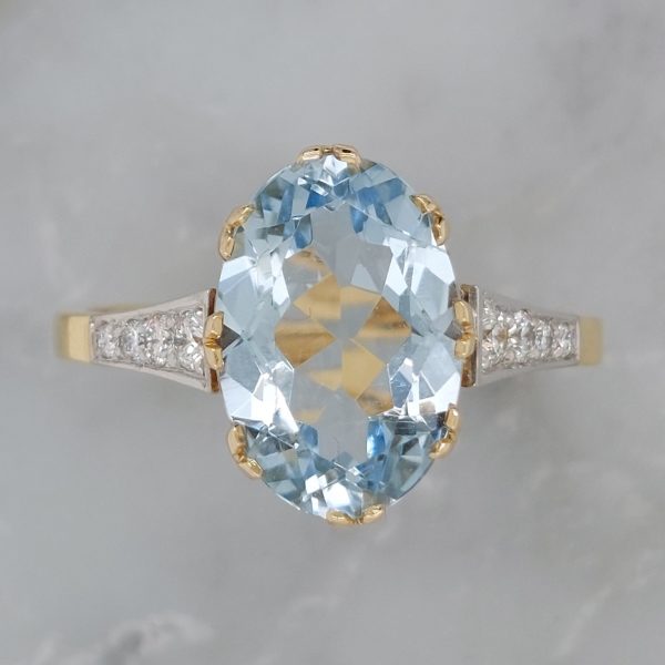 4ct Aquamarine Solitaire Ring with Diamond Set Shoulders