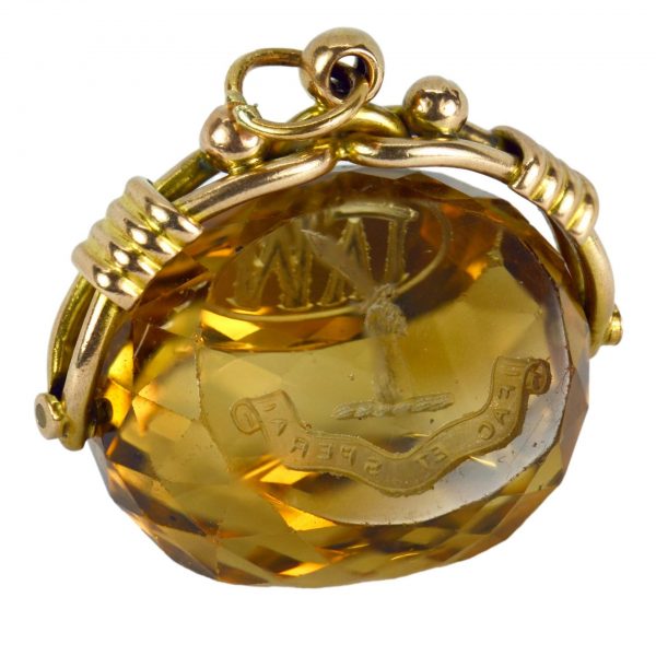 Engraved Citrine and Yellow Gold Spinning Fob Charm Pendant; large spinning citrine fob engraved with monogram, crest and motto, in 9ct gold London 1967