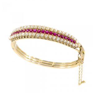 Antique Victorian 2.20ct Ruby and Pearl Bangle Bracelet in 14ct Gold, late 19th century Circa 1880