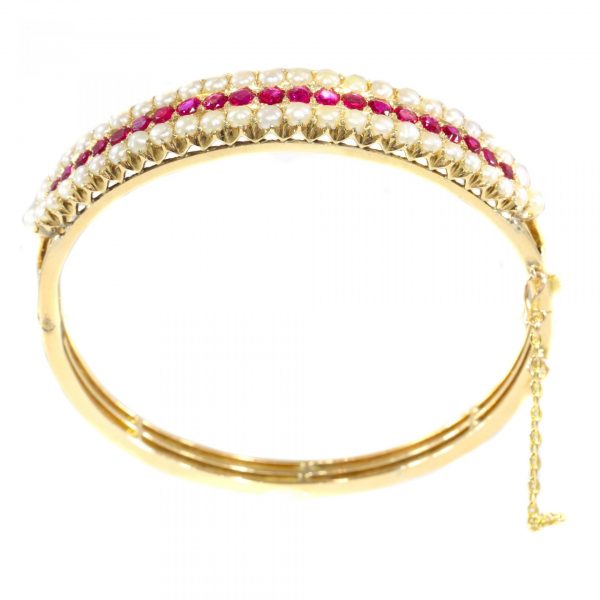 Antique Victorian 2.20ct Ruby and Pearl Bangle Bracelet in 14ct Gold, late 19th century Circa 1880