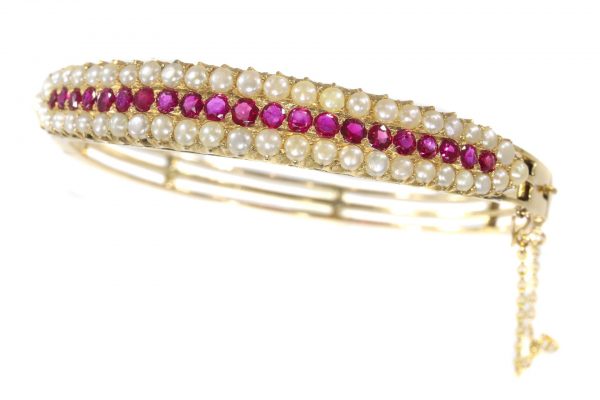 Antique Victorian 2.20ct Ruby and Pearl Bangle Bracelet in 14ct Gold, late 19th century Circa 1880