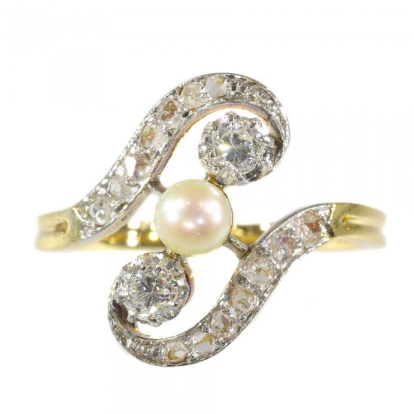 Antique Belle Epoque Diamond and Pearl Three Stone Crossover Ring