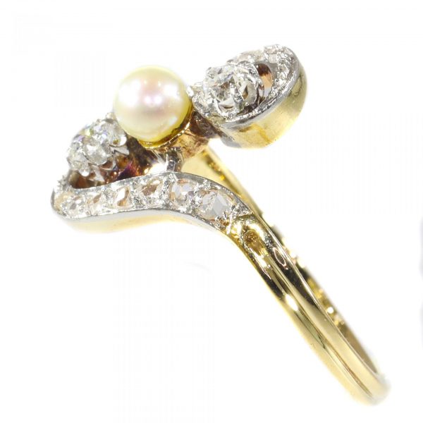 Antique Belle Epoque Diamond and Pearl Three Stone Crossover Ring