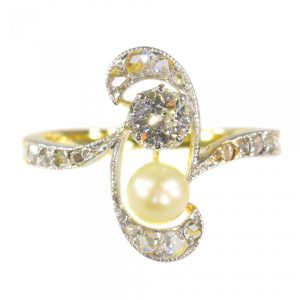 Antique Art Nouveau Diamond and Pearl Two Stone Whiplash Ring