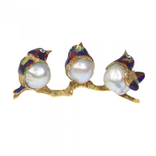 Vintage Italian Enamel and Pearl Birds on a Branch Brooch; each whimsical bird is set with a baroque pearl to the stomach and is decorated with red, green and blue enamel to the heads and backs, in 18ct yellow gold. Circa 1970
