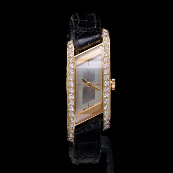 Yves Saint Laurent Rive Gauche 18ct Gold and Diamond Watch, ref 1596, 18ct yellow gold case with mother-of-pearl dial and 1.90ct diamond set surround, on original leather strap, Circa 2000s