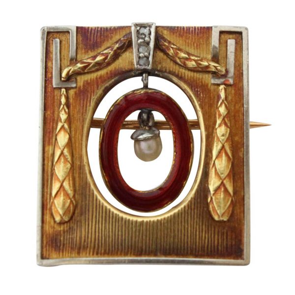 Antique Jugendstil Enamel and Gold Brooch by Theodor Fahrner; 18ct yellow gold frame with plaited swag in relief and central swinging natural pearl within red enamel oval surround. Circa 1900-1910