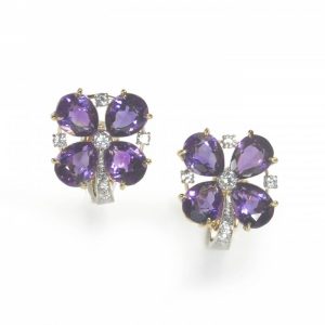 Vintage Tiffany and Co Amethyst and Diamond Four Leaf Clover Earrings; pear-shape faceted amethysts accented with round brilliant-cut diamonds, in 14ct gold, Made in USA, Circa 1980
