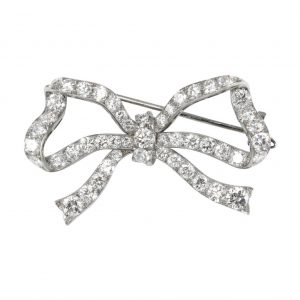 Vintage Diamond Ribbon Bow Brooch in 18ct White Gold, 7 carat total, Circa 1980s