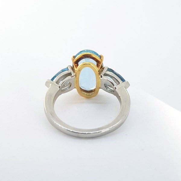 Oval Cut Aquamarine Ring with Pear Cut Shoulders
