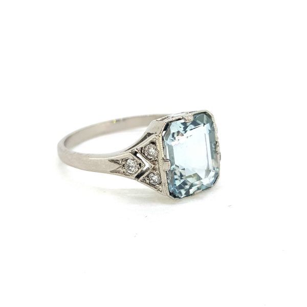 2ct Aquamarine and Diamond Dress Ring in Platinum, central 2ct step-cut aquamarine with detailed diamond-set kite shoulders