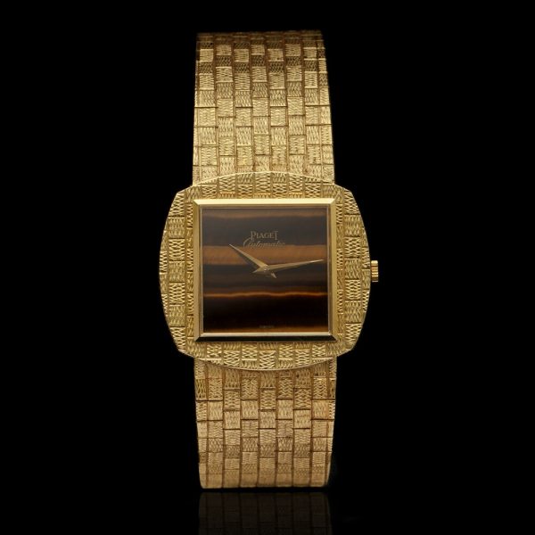 Vintage Piaget Tiger Eye and 18ct Yellow Gold Watch, tiger eye dial enveloped within 18ct yellow gold case, on 18ct yellow gold bracelet, with sapphire crystal and automatic movement, Circa 1970s