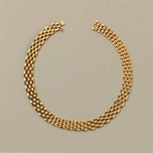 Cartier Panthere 18ct Yellow Gold Necklace; classic five-row choker necklace with a grain de riz pattern. Signed and numbered Cartier, 632144, French