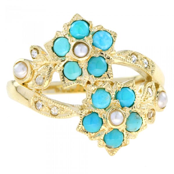 Vintage Turquoise and Pearl Floral Cluster Crossover Ring; double cabochon turquoise flowers accented with pearls and diamonds in 14ct yellow gold