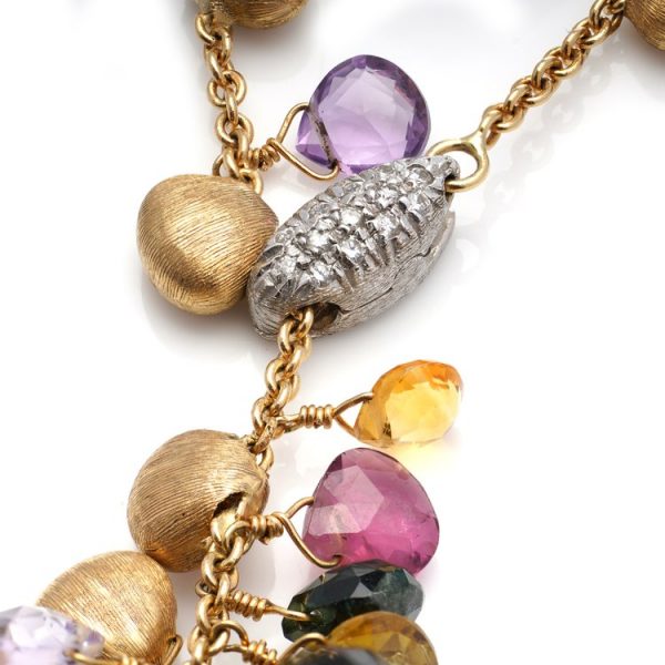 Marco Bicego Paradise Collection Multi Gemstone Lariat Necklace; decorated with diamonds and briolette-cut garnets, amethysts, citrine, blue topaz, pink and green tourmaline and rock crystal and intermingled with hand-made satin-finish gold beads