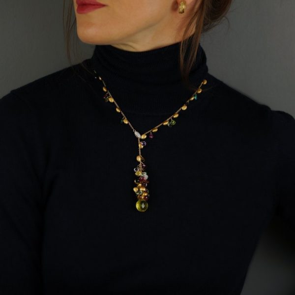 Marco Bicego Paradise Collection Multi Gemstone Lariat Necklace; decorated with diamonds and briolette-cut garnets, amethysts, citrine, blue topaz, pink and green tourmaline and rock crystal and intermingled with hand-made satin-finish gold beads