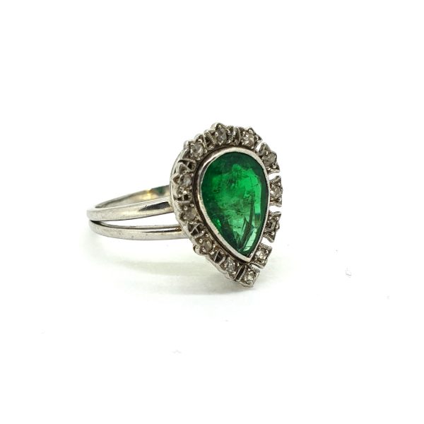 Vintage 1.60ct Colombian Emerald and Diamond Pear Shaped Cluster Ring; featuring a central GCS certified natural pear-shaped Colombian emerald with moderate oil, surrounded by a diamond border in 18ct white gold