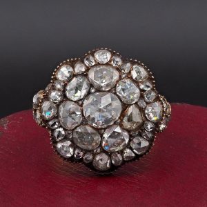 Impressive Antique Georgian 4.5ct Rose Cut Diamond Cluster Ring, in silver-upon-gold with diamond-set leaf detailing to the shoulders, Circa 1790-1800
