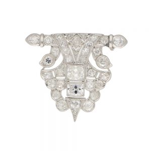 Vintage Geometric Panel 5.2ct Diamond Brooch in Platinum; tapering scrolled and scalloped motifs set with 5.20 carats of old mine-cut, old European-cut, single-cut and transitional-cut diamonds